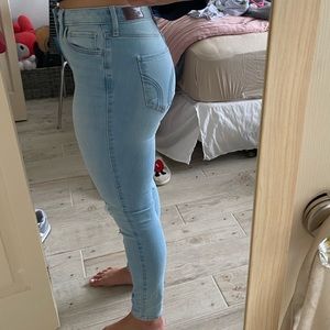 Light blue ripped jeans